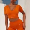 Gradient Scoop Neck Ruched Crop Top In Deep Orange -Core Fit Shop bt0361 bt0366 1 gradient flash deep orange scrunched front short sleeve crop top high waist shorts sportswear set 1