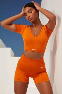 Gradient Scoop Neck Ruched Crop Top In Deep Orange -Core Fit Shop bt0361 bt0366 2 gradient flash deep orange scrunched front short sleeve crop top high waist shorts sportswear set 1
