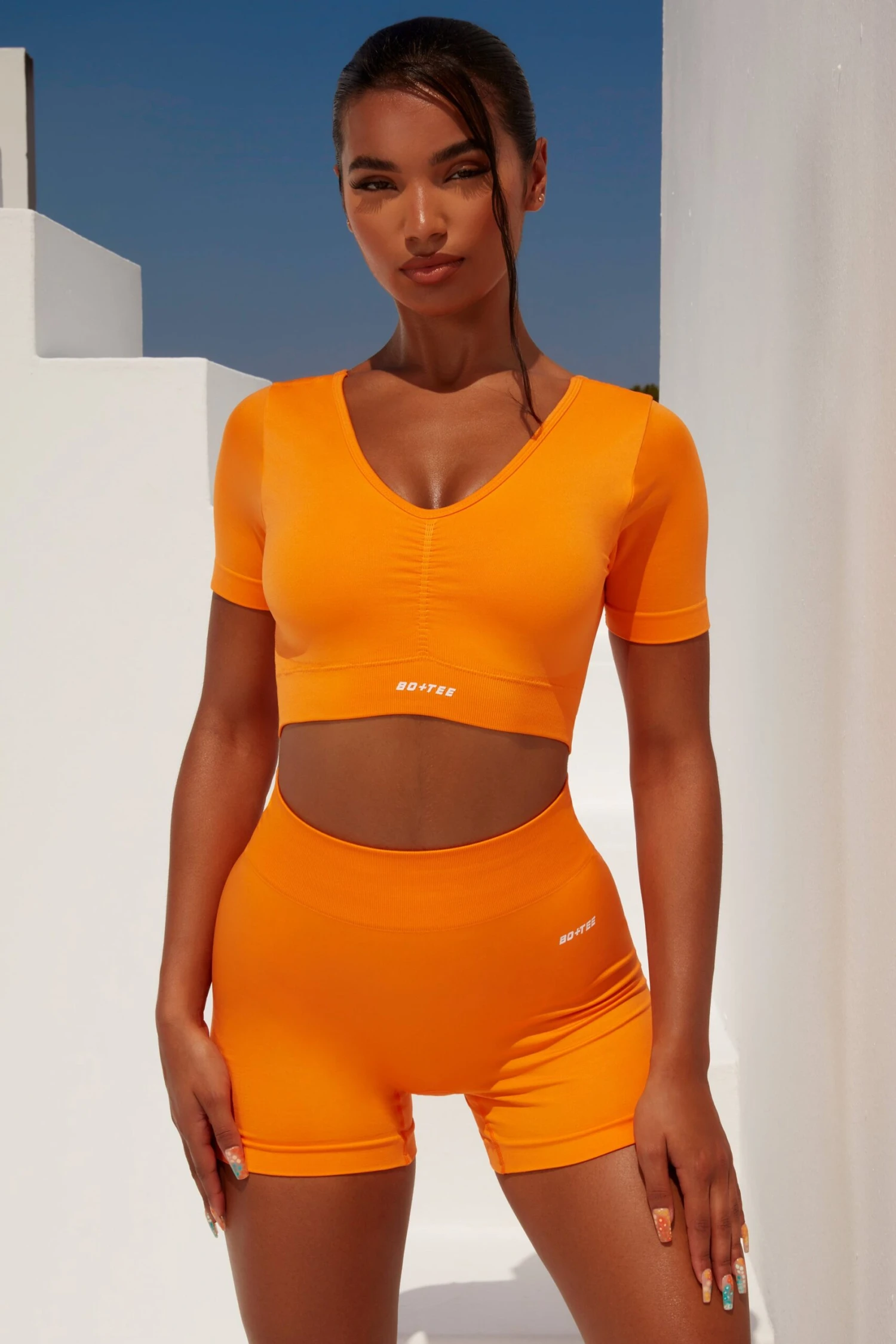 Curved Waist Seamless Mini Shorts In Orange 11 Curved Waist Seamless Mini Shorts In Orange - Image 9