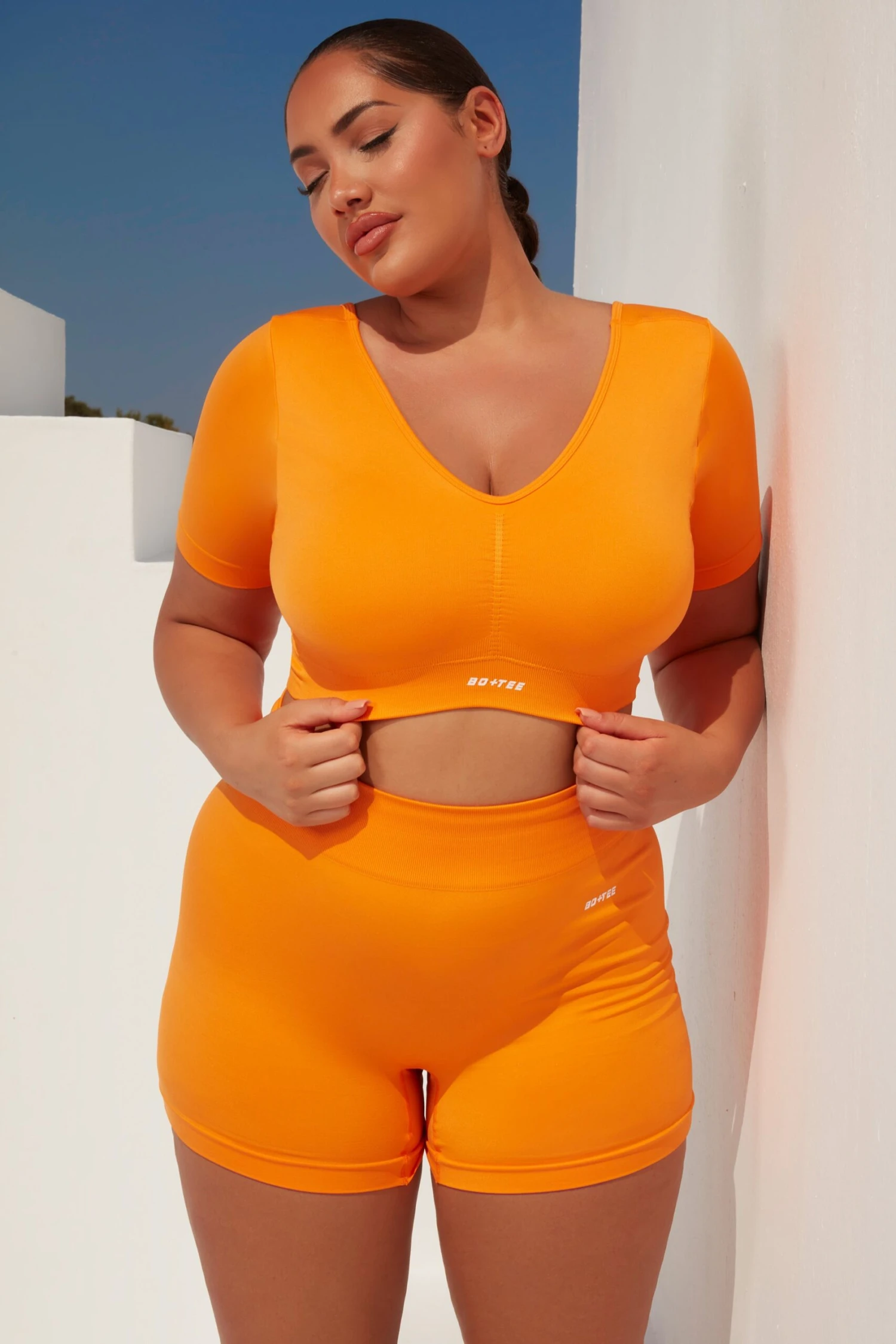 Curved Waist Seamless Mini Shorts In Orange 8 Curved Waist Seamless Mini Shorts In Orange - Image 6