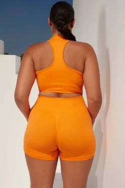 Radiate Ruched Sports Bra In Orange 26 Radiate Ruched Sports Bra In Orange -Core Fit Shop bt0363 bt0366 14 orange ribbed detail crop top high waisted shorts 1