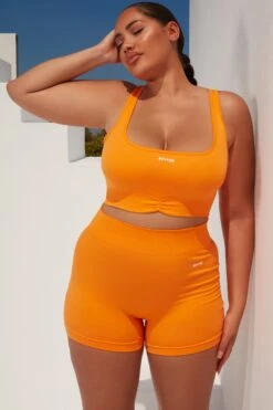 Radiate Ruched Sports Bra In Orange 30 Radiate Ruched Sports Bra In Orange -Core Fit Shop bt0363 bt0366 15 orange ribbed detail crop top high waisted shorts 1