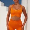 Radiate Ruched Sports Bra In Deep Orange