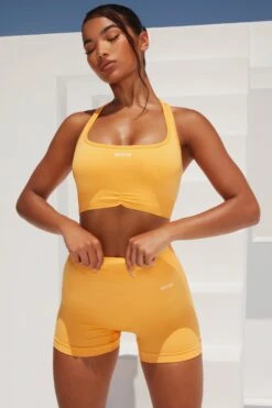 Radiate Ruched Sports Bra In Light Orange -Core Fit Shop bt0363 bt0366 6 l orange ribbed detail crop top high waisted shorts 1