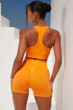 Radiate Ruched Sports Bra In Orange 20 Radiate Ruched Sports Bra In Orange -Core Fit Shop bt0363 bt0366 6 orange ribbed detail crop top high waisted shorts 1