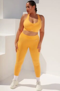 Surge Curved Waist Seamless Leggings In Light Orange 18 Surge Curved Waist Seamless Leggings In Light Orange -Core Fit Shop bt0364 bt0365 14 surge light orange leggings beam light crop top 4