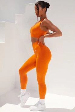 Surge Curved Waist Seamless Leggings In Deep Orange -Core Fit Shop bt0364 bt0365 5 surge deep orange leggings beam light crop top 2