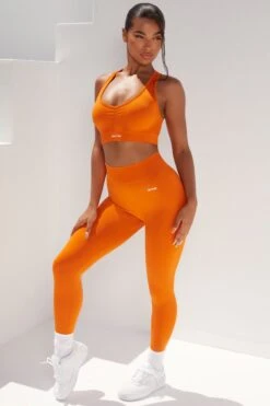 Surge Curved Waist Seamless Leggings In Deep Orange -Core Fit Shop bt0364 bt0365 9 surge deep orange leggings beam light crop top