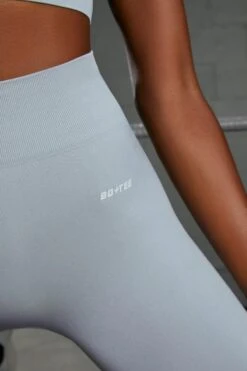 Surge Curved Waist Seamless Leggings In Light Blue -Core Fit Shop bt0365 bt0370 11 surge awaken light blue strappy crop top high waist leggings seamless