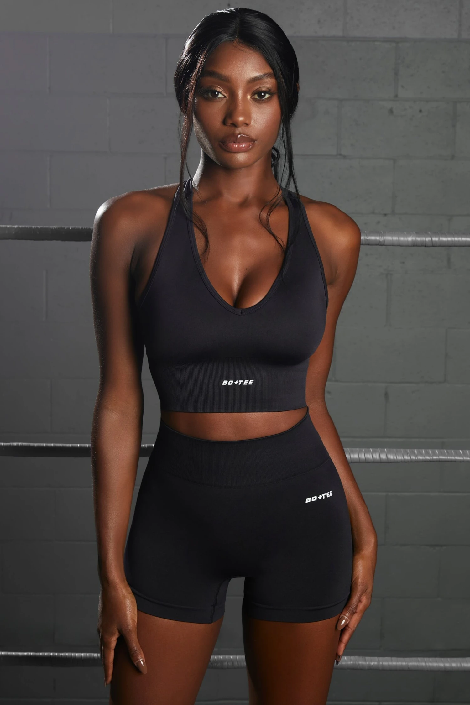 Racer Knot Back Seamless Crop Top In Black 6 Racer Knot Back Seamless Crop Top In Black - Image 4