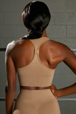 Overhaul Racer Knot Back Seamless Crop Top In Brown -Core Fit Shop bt0366 bt0372 8 flash overhaul brown scoop neck crop top shorts seamless sportswear