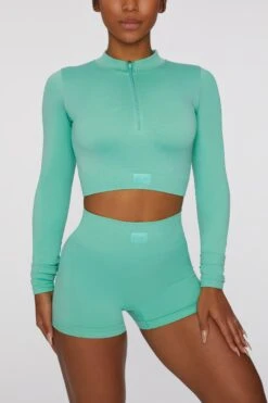 Long Sleeve Crop Top In Turquoise -Core Fit Shop bt0409 2 reach for it turquoise zip crop top